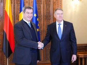 Ce mai face trântorul Iohannis!? Presa germană scrie că premierul Bavariei a cerut forță de muncă ieftină la Ciucă și Iohannis – 60m.ro