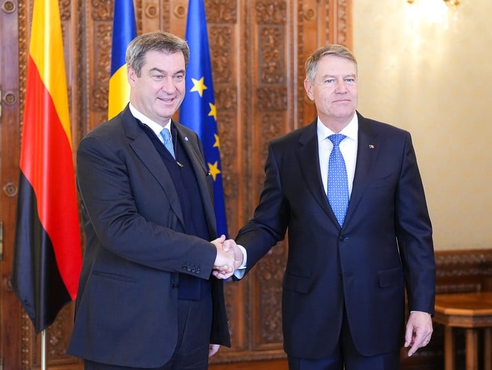 Ce mai face trântorul Iohannis!? Presa germană scrie că premierul Bavariei a cerut forță de muncă ieftină la Ciucă și Iohannis – 60m.ro