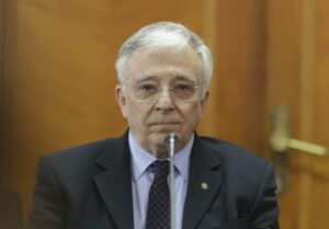 Isărescu, un dezastru pentru economie: ascunde falimentul băncilor prin fuziuni orchestrate – 60m.ro